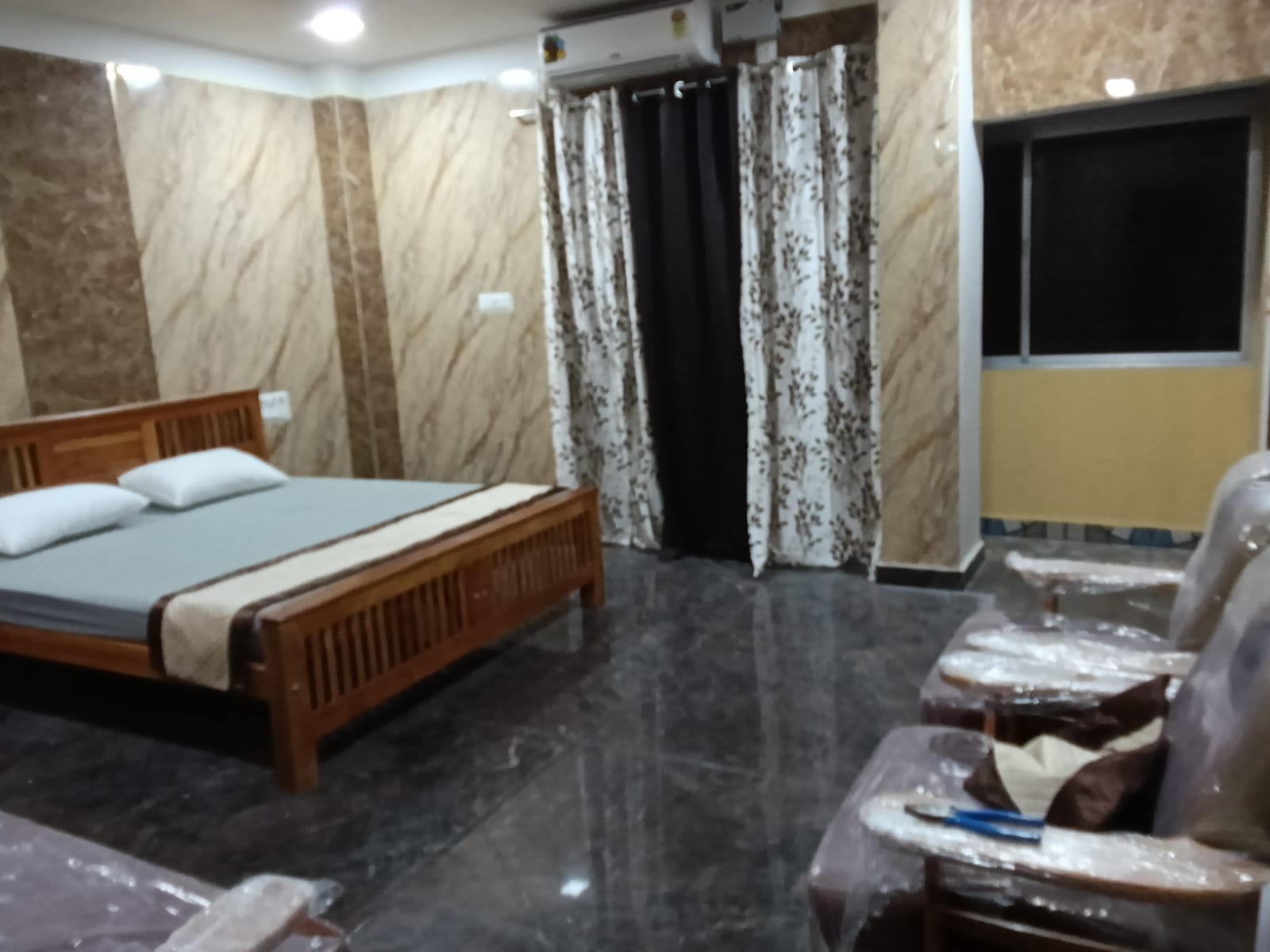 AC room with balcony access, sofa seating and nature view